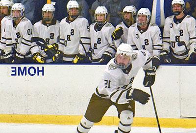 Hockey players on the ice in Olean